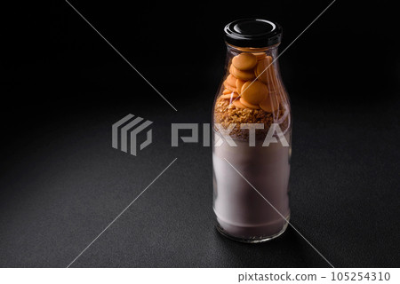 Ingredients for making delicious sweet pancakes that are portioned in a bottle Ingredients for making delicious sweet pancakes that are portioned in a bottle 105254310