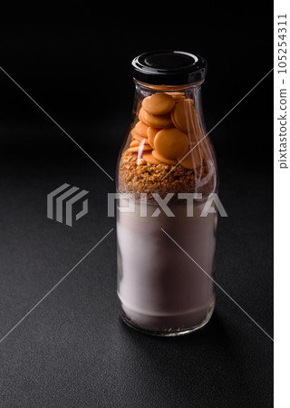 Ingredients for making delicious sweet pancakes that are portioned in a bottle 105254311