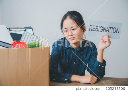 Female company employee stressed and fed up after quitting her job to look for a new job, fired or was fired by the employer 105255508