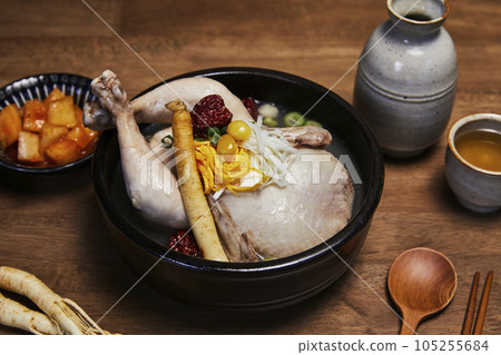 korean traditional food samgyetang, chicken soup with ginseng with korean traditional alcohol korean traditional food samgyetang, chicken soup with ginseng with korean traditional alcohol 105255684