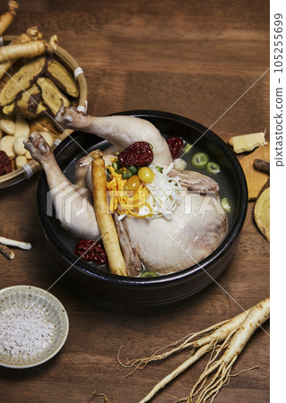 korean traditional food samgyetang, chicken soup with ginseng and herbs korean traditional food samgyetang, chicken soup with ginseng and herbs 105255699