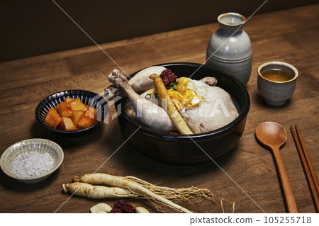korean traditional food samgyetang, chicken soup with ginseng with korean traditional alcohol korean traditional food samgyetang, chicken soup with ginseng with korean traditional alcohol 105255718