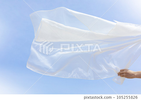 beautiful beach and fabric blowing in the wind 105255826
