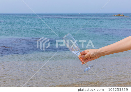 beach and champagne glass beach and champagne glass 105255859