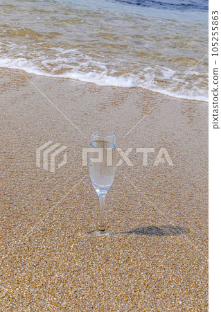 beach and champagne glass beach and champagne glass 105255863