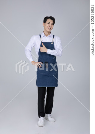 millennials and gen z, korean asian young man with hand motion millennials and gen z, korean asian young man with hand motion 105256022