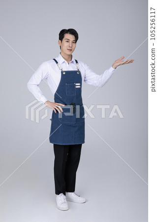 millennials and gen z, korean asian young man with hand guide 105256117