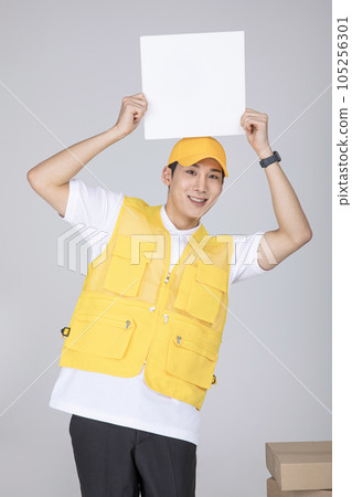 millennials and gen z, korean asian young man holding a frame panel 105256301