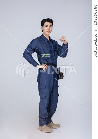 millennials and gen z, korean asian young man, site staff with hand motion millennials and gen z, korean asian young man, site staff with hand motion 105256860
