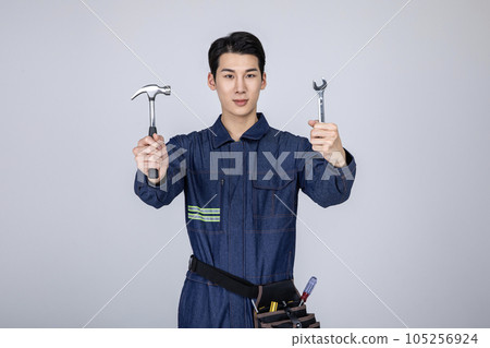 millennials and gen z, korean asian young man, site staff with tools millennials and gen z, korean asian young man, site staff with tools 105256924