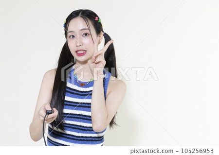 vintage y2k retro concept photo of korean asian cute woman taking selfie 105256953