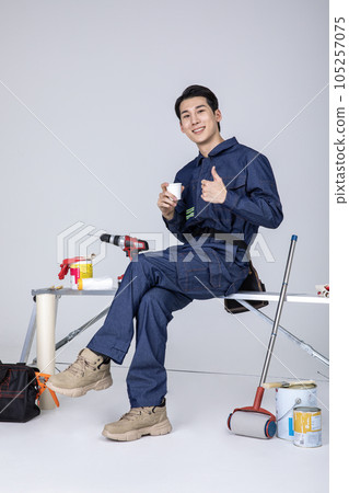 millennials and gen z, korean asian young man, site staff with coffee millennials and gen z, korean asian young man, site staff with coffee 105257075