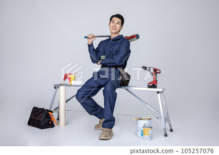 millennials and gen z, korean asian young man, site staff sitting in the work field millennials and gen z, korean asian young man, site staff sitting in the work field 105257076