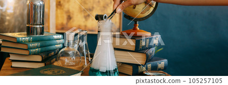 Schoolgirl perform chemical experiments. Back to school. School and preschool education. 105257105