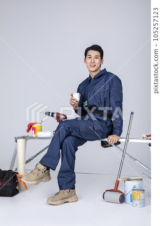 millennials and gen z, korean asian young man, site staff with coffee millennials and gen z, korean asian young man, site staff with coffee 105257123