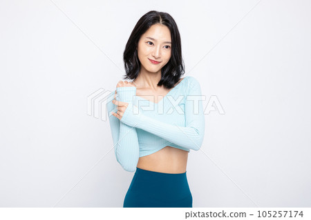 healthy beauty concept photo of korean asian beautiful woman stretching healthy beauty concept photo of korean asian beautiful woman stretching 105257174