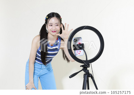 vintage y2k retro concept photo of korean asian cute woman filming short-form content vintage y2k retro concept photo of korean asian cute woman filming short-form content 105257175