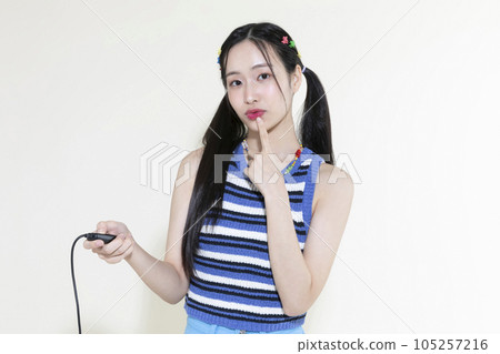 vintage y2k retro concept photo of korean asian cute woman taking selfie 105257216