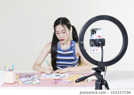 vintage y2k retro concept photo of korean asian cute woman filming diary decoration 105257296