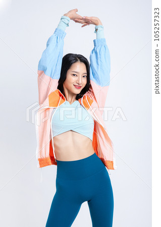 healthy beauty concept photo of korean asian beautiful woman stretching with jacket healthy beauty concept photo of korean asian beautiful woman stretching with jacket 105257323