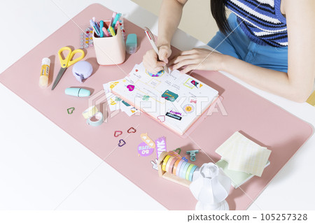 vintage y2k retro concept photo of korean asian cute woman decorating diary vintage y2k retro concept photo of korean asian cute woman decorating diary 105257328
