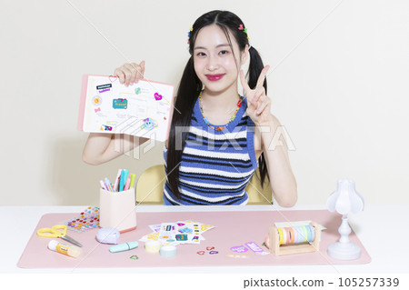 vintage y2k retro concept photo of korean asian cute woman with decorated diary vintage y2k retro concept photo of korean asian cute woman with decorated diary 105257339