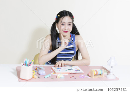 vintage y2k retro concept photo of korean asian cute woman decorating diary vintage y2k retro concept photo of korean asian cute woman decorating diary 105257381