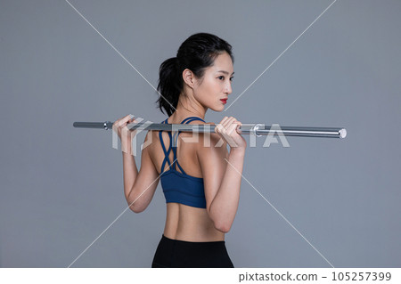 healthy beauty concept photo of korean asian beautiful woman with barbell healthy beauty concept photo of korean asian beautiful woman with barbell 105257399