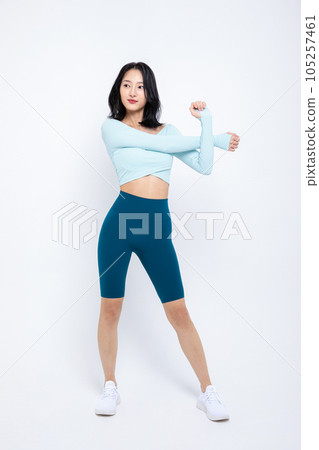 healthy beauty concept photo of korean asian beautiful woman stretching 105257461
