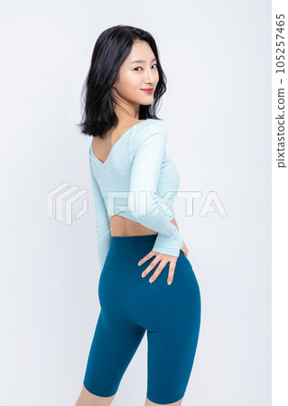 healthy beauty concept photo of korean asian beautiful woman stretching 105257465