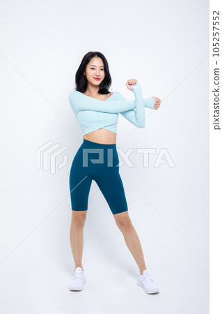 healthy beauty concept photo of korean asian beautiful woman stretching 105257552