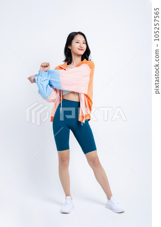 healthy beauty concept photo of korean asian beautiful woman stretching with jacket healthy beauty concept photo of korean asian beautiful woman stretching with jacket 105257565