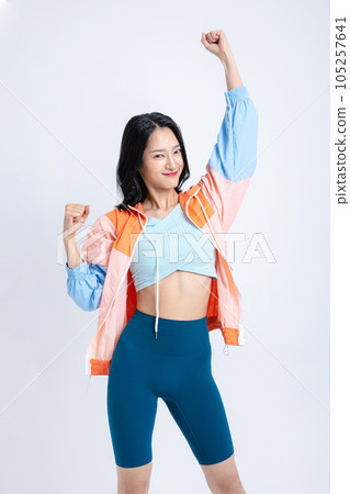 healthy beauty concept photo of korean asian beautiful woman stretching with jacket healthy beauty concept photo of korean asian beautiful woman stretching with jacket 105257641