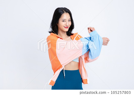 healthy beauty concept photo of korean asian beautiful woman stretching with jacket healthy beauty concept photo of korean asian beautiful woman stretching with jacket 105257803