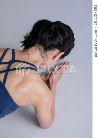 healthy beauty concept photo of korean asian beautiful woman doing planks 105257892