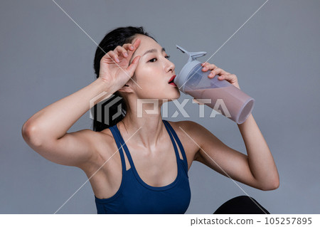 healthy beauty concept photo of korean asian beautiful woman with protein shakes healthy beauty concept photo of korean asian beautiful woman with protein shakes 105257895