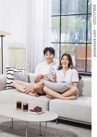summer lifestyle, korean asian young couple with fan and handheld fan 105257908