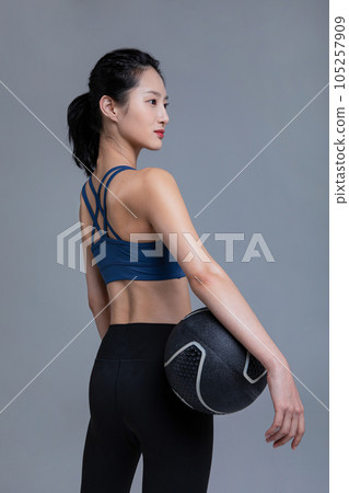 healthy beauty concept photo of korean asian beautiful woman with fitness ball 105257909