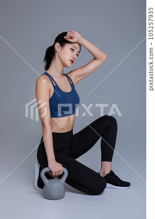 healthy beauty concept photo of korean asian beautiful woman with kettlebell healthy beauty concept photo of korean asian beautiful woman with kettlebell 105257935