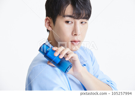 korean asian young man with skincare products 105257994