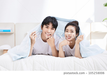 summer lifestyle, korean asian young couple with bed 105258006