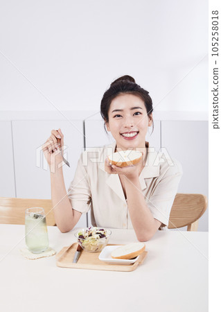 summer lifestyle, korean asian young woman smiling with brunch summer lifestyle, korean asian young woman smiling with brunch 105258018