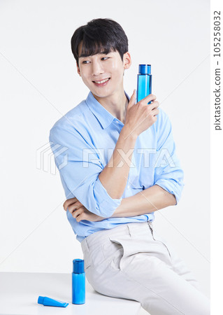 korean asian young man with skincare products 105258032