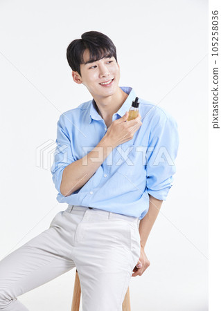 korean asian young man with skincare products 105258036