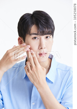 korean asian young man with skin concerns 105258078