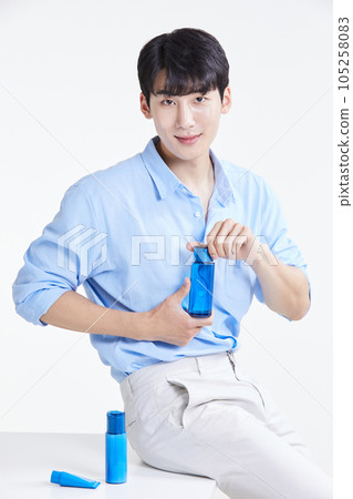 korean asian young man with skincare products 105258083