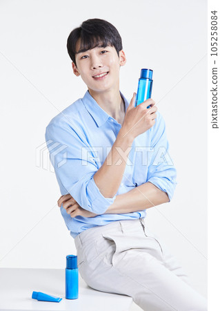 korean asian young man with skincare products korean asian young man with skincare products 105258084