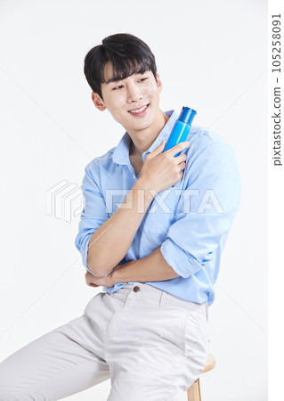 korean asian young man with skincare products korean asian young man with skincare products 105258091