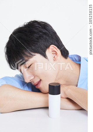 korean asian young man smiling with prone position 105258135