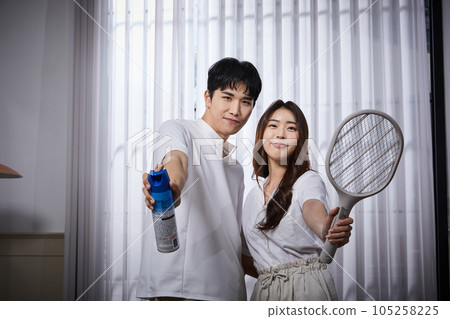 summer lifestyle, korean asian young couple and kill bugs summer lifestyle, korean asian young couple and kill bugs 105258225
